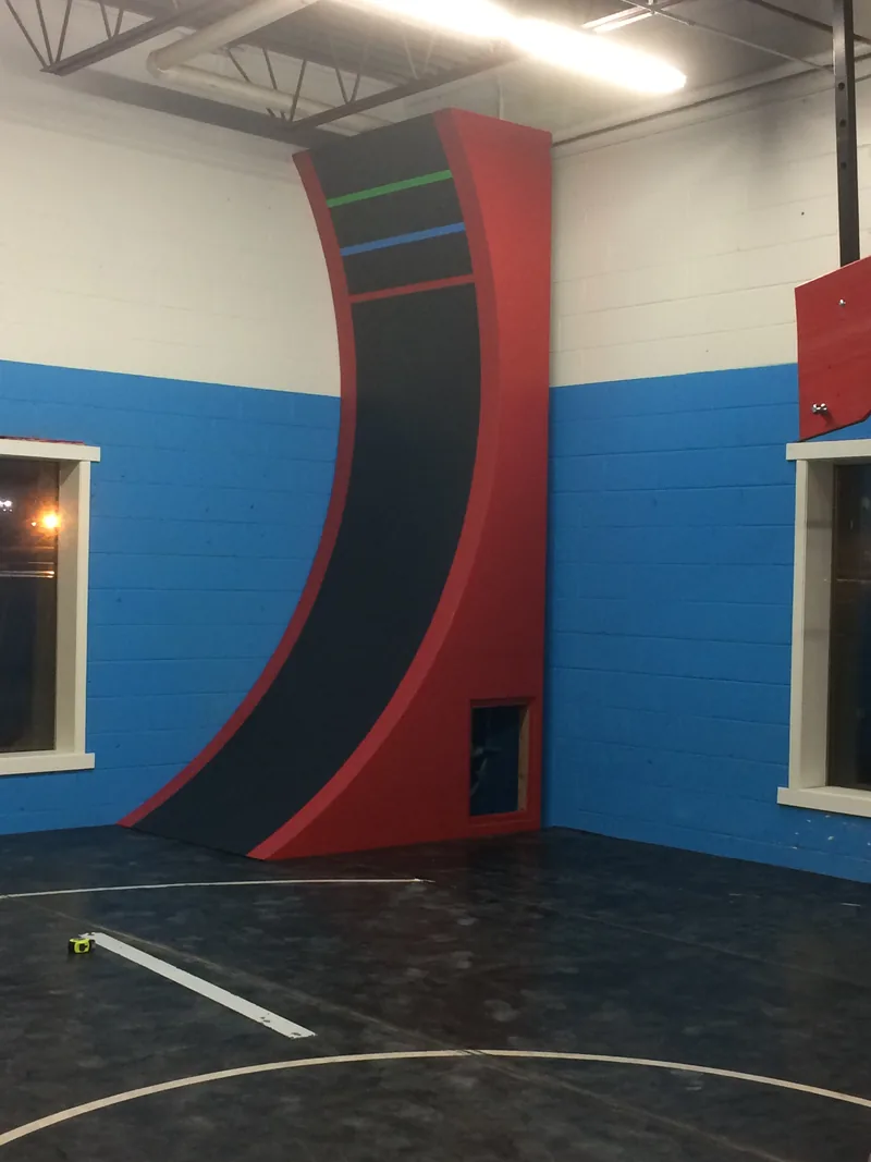The McLain family’s red and black indoor Warped Wall